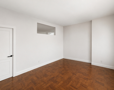 E 56th Street - Photo Thumbnail 2