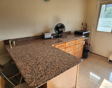 61-55 98th Street - Photo Thumbnail 4