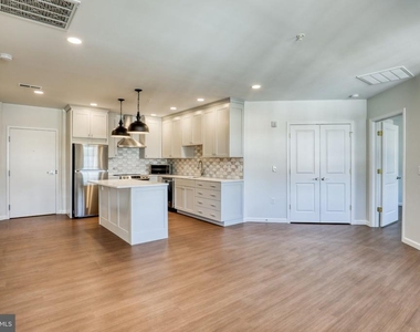210 E Boscawen Street - Photo Thumbnail 2