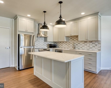 210 E Boscawen Street - Photo Thumbnail 3