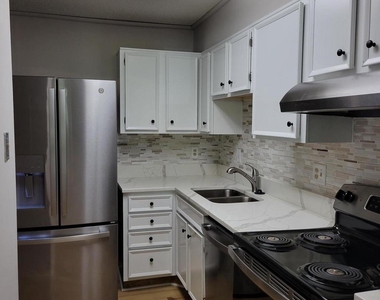 5901 Mount Eagle Drive - Photo Thumbnail 4