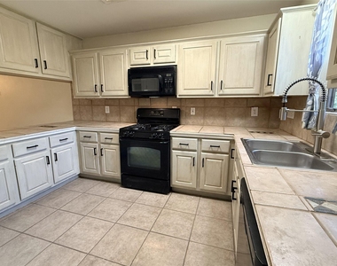 7907 Dunn St - Photo Thumbnail 7