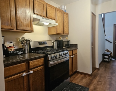 10956 S 76th Avenue - Photo Thumbnail 3