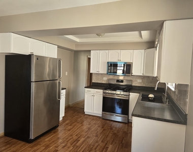 5454 W Schubert Avenue - Photo Thumbnail 2
