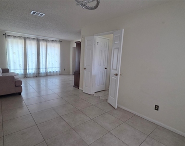 15006 Delbarton Drive - Photo Thumbnail 4