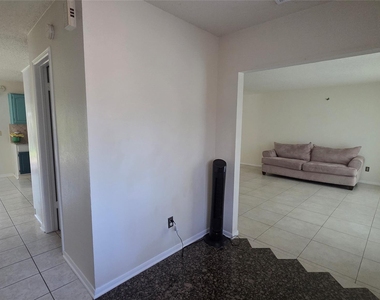 15006 Delbarton Drive - Photo Thumbnail 1