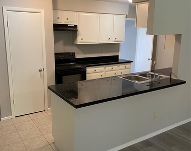 7547 Winkle Wood Lane - Photo Thumbnail 7