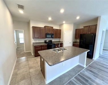 9746 Sage Creek Drive - Photo Thumbnail 3