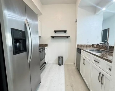 1064 N Tamiami Trail - Photo Thumbnail 5