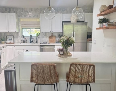1003 Tropical Avenue - Photo Thumbnail 3