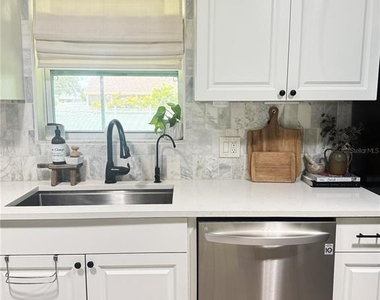 1003 Tropical Avenue - Photo Thumbnail 16