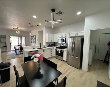 9825 Garamound Avenue - Photo Thumbnail 2