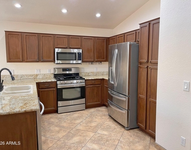 9144 W Villa Rita Drive - Photo Thumbnail 6