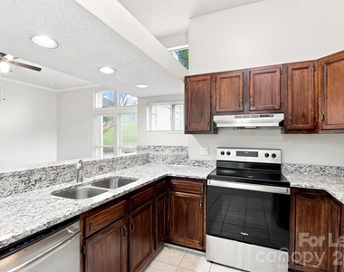 9719 Marshbrooke Road - Photo Thumbnail 2