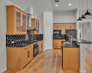 9129 Cottonwood Village Drive - Photo Thumbnail 3