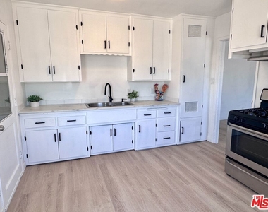 1542 W 60th Street - Photo Thumbnail 2
