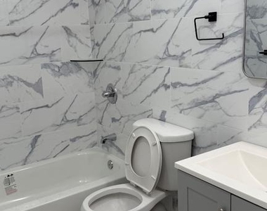 6049 Walton Avenue - Photo Thumbnail 2