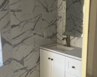 6049 Walton Avenue - Photo Thumbnail 8