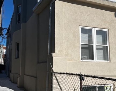 6049 Walton Avenue - Photo Thumbnail 3