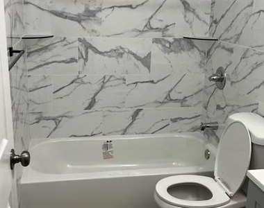 6049 Walton Avenue - Photo Thumbnail 6