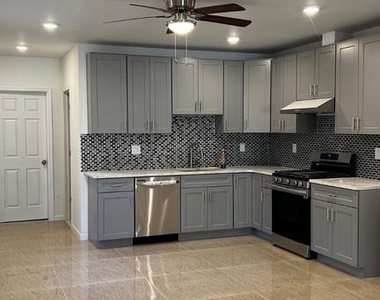6049 Walton Avenue - Photo Thumbnail 4
