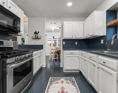 1502 Quail Run Rd - Photo Thumbnail 7