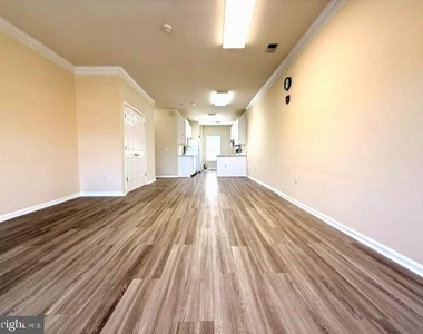 324 Top Floor Main Street - Photo Thumbnail 1