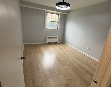 6700 S Paxton Avenue - Photo Thumbnail 1