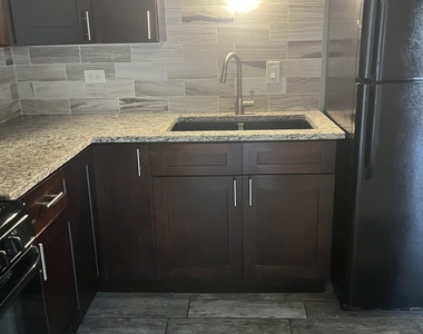 5740 W 108th Street - Photo Thumbnail 2