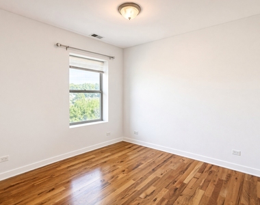 7225 N Rogers Avenue - Photo Thumbnail 7