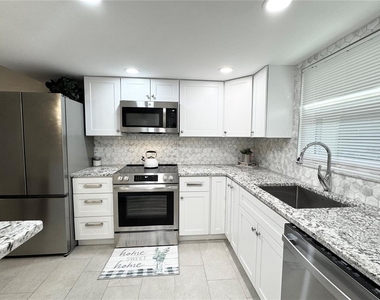 1100 E Bay Drive - Photo Thumbnail 5