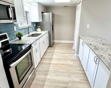 7939 Pine Drive - Photo Thumbnail 1