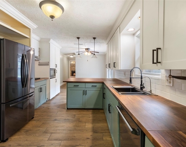 8215 Winding Hill Lane - Photo Thumbnail 13