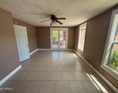 1165 E 10th Street - Photo Thumbnail 2