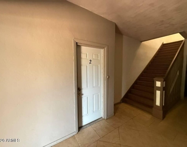 1165 E 10th Street - Photo Thumbnail 1