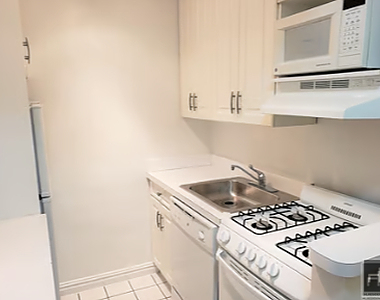 East 80 Street - Photo Thumbnail 2