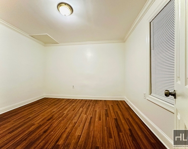 East 228th Street - Photo Thumbnail 3