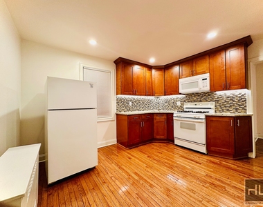 East 228th Street - Photo Thumbnail 1