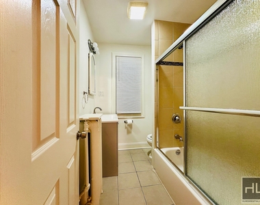 East 228th Street - Photo Thumbnail 6