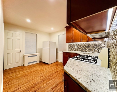 East 228th Street - Photo Thumbnail 2