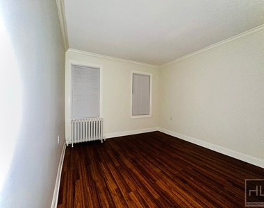 East 228th Street - Photo Thumbnail 5