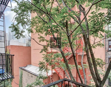 West 50 Street - Photo Thumbnail 1