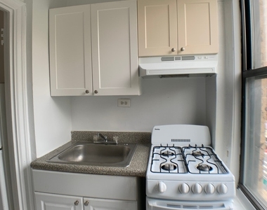 E 58th St - Photo Thumbnail 1