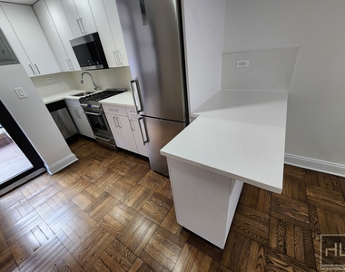 East 35 Street - Photo Thumbnail 2