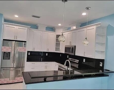 409 Broward Avenue - Photo Thumbnail 1