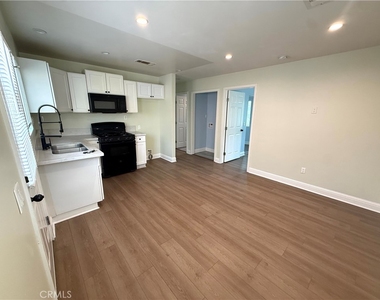 1334 W 65th Street - Photo Thumbnail 2
