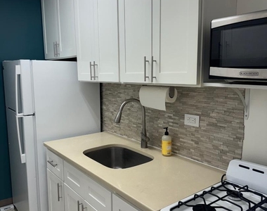 84-10 153rd Avenue - Photo Thumbnail 3