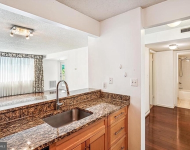 10101 Grosvenor Place - Photo Thumbnail 6