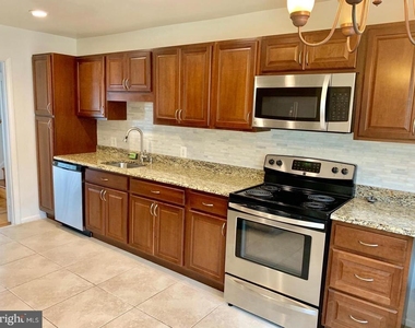 6414 Wilson Lane - Photo Thumbnail 7