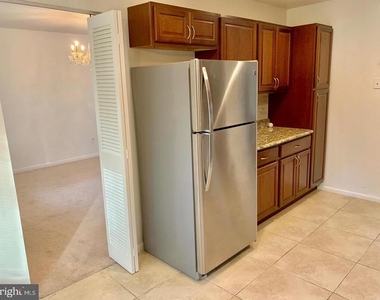 6414 Wilson Lane - Photo Thumbnail 8